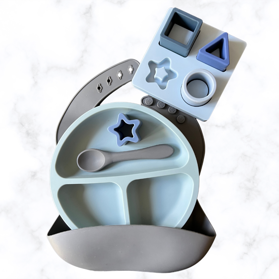 Baby Gift Bundle. Charcoal Bib, silicone spoon, Dusty Blue divided Suction Plate & Silicone Shape Puzzle Sorter Puzzle