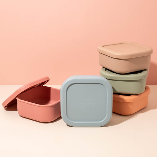 silicone versatile boxes in five colours. bento box. lunch box for infants.
