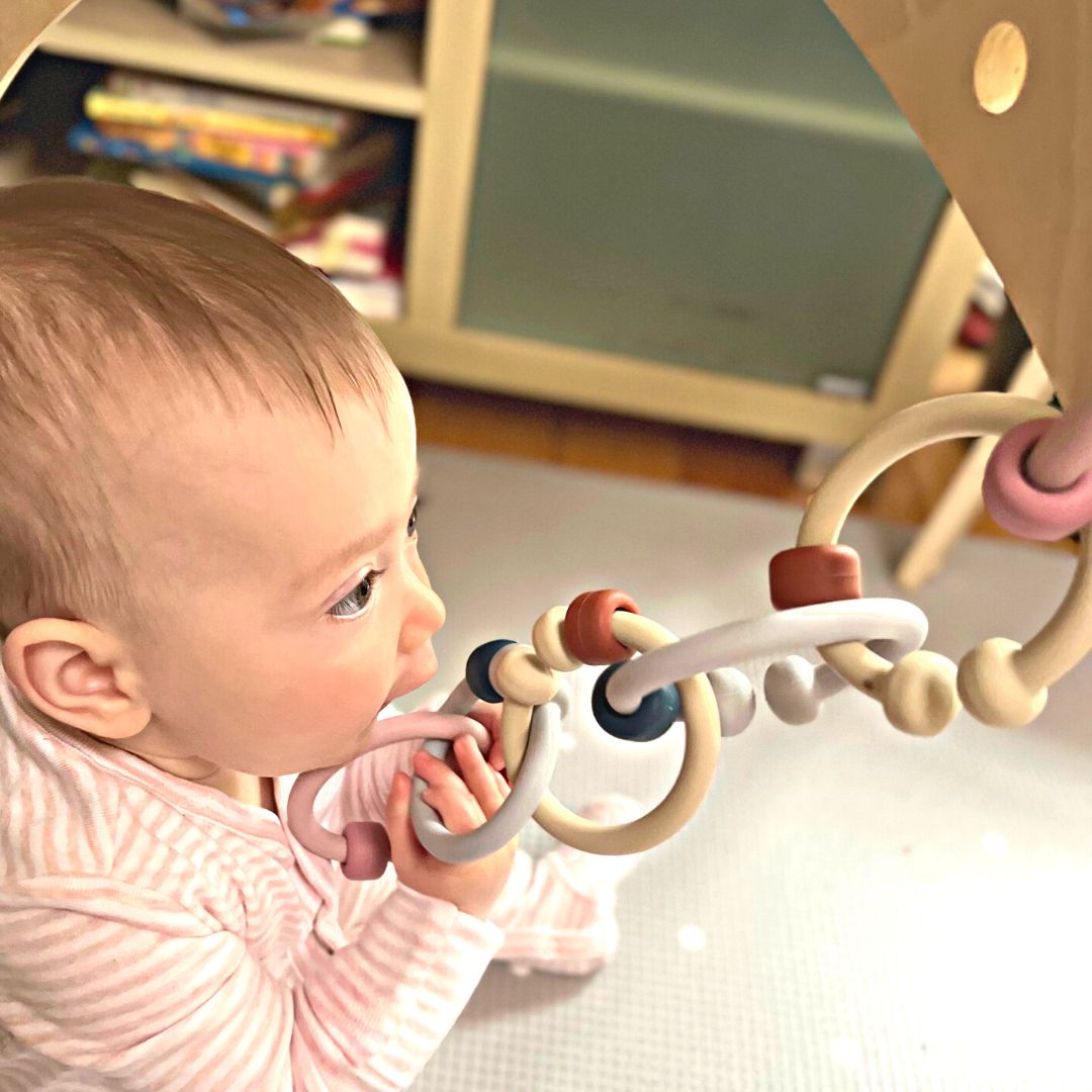 attached silicone linked rings for infant
