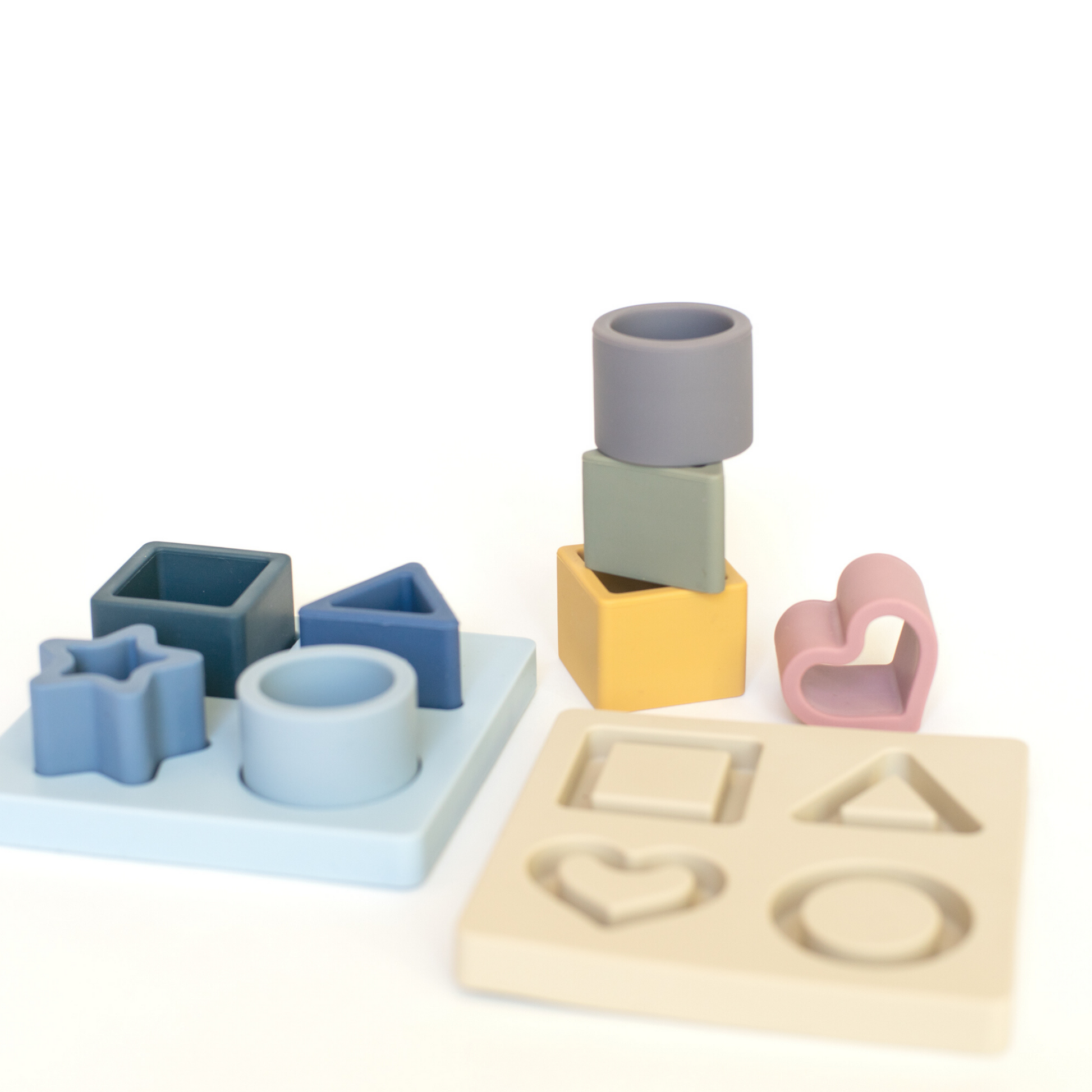 Silicone puzzle. Shape sorter. Silicone base and puzzle pieces.